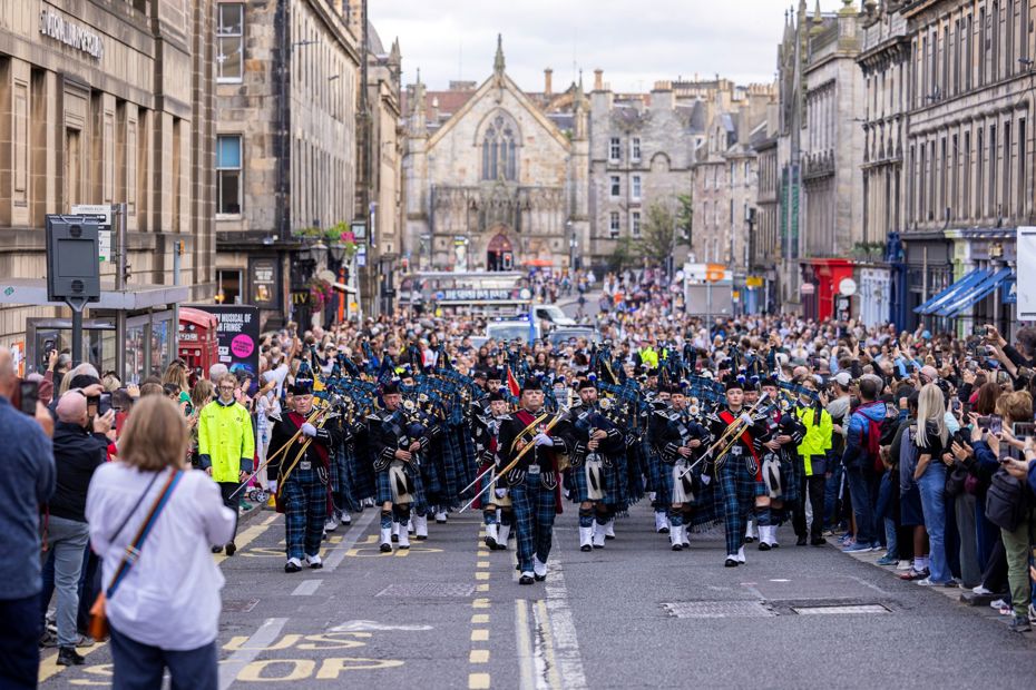 The Royal Edinburgh Military Tattoo Pipes And Drums march in the streets of Edinburgh in August 2026