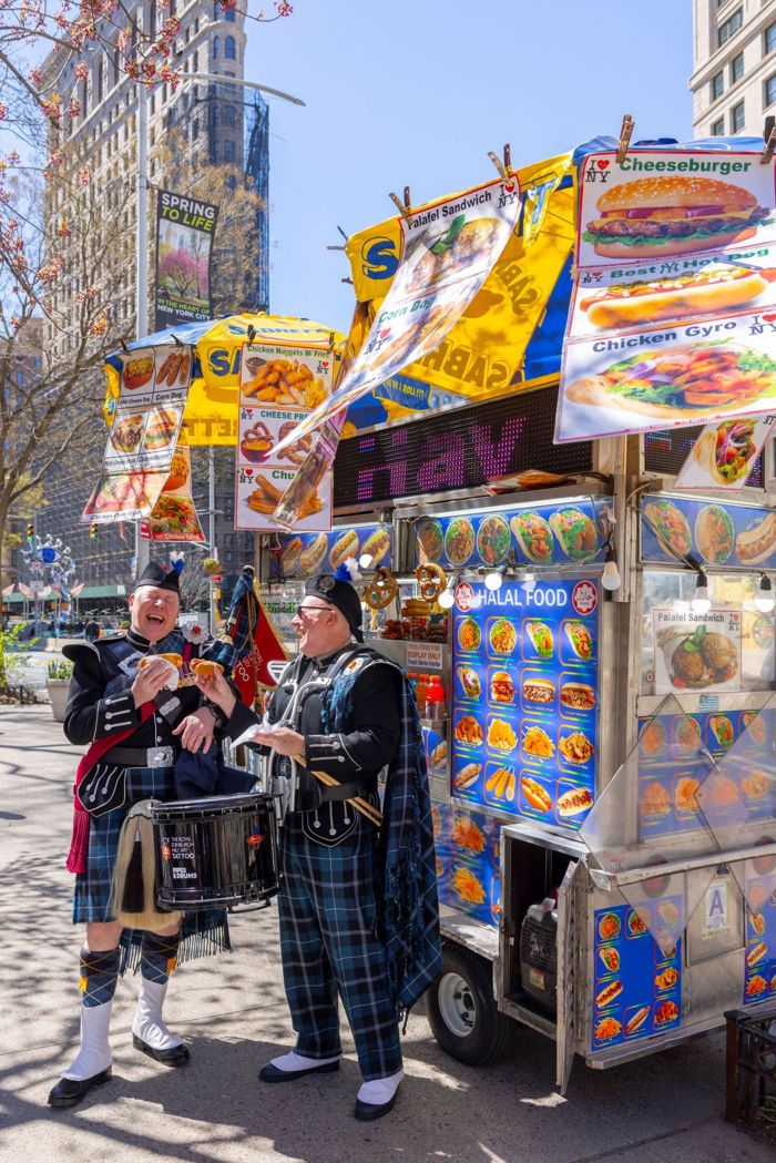 Image of Tattoo Bagpipers at a Hot Dog at Tartan Week in NYC 