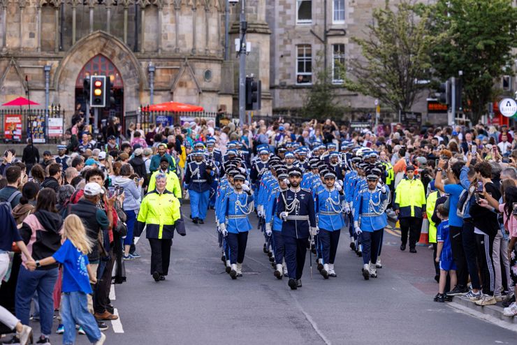 Qatar Police Academy Band And Drill Team join Edinburgh Tattoo in the march through the streets of Edinburgh in August 2026