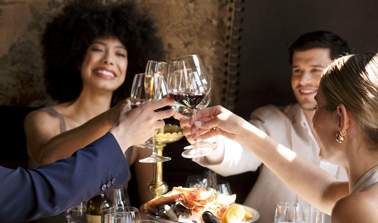 Guests enjoying The Royal Edinburgh Military Tattoo hospitality package at The Witchery restaurant
